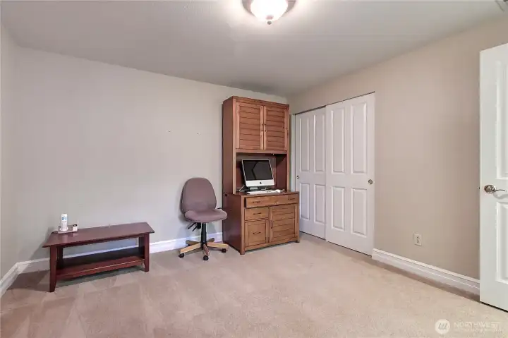 Second bedroom with large storage closet.