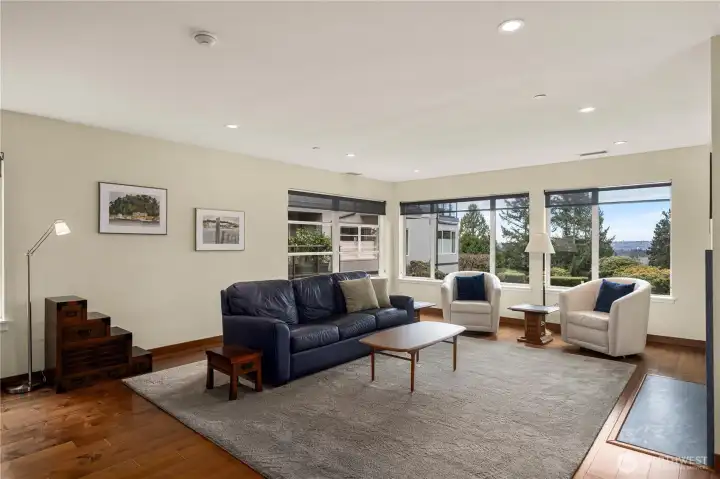 Great room living with filtered views of Seattle, Lake Washington and Olympic Mountains.