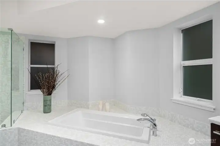 Oversized soaking tub ultimate relaxation.