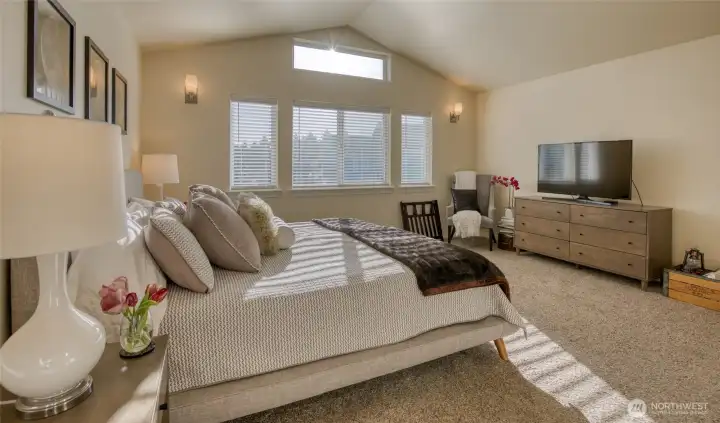 You'll enjoy waking with the sun from this primary bedroom that is East facing.