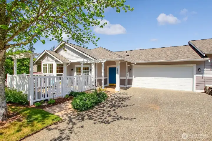 Forest Village condo home with 2 car garage