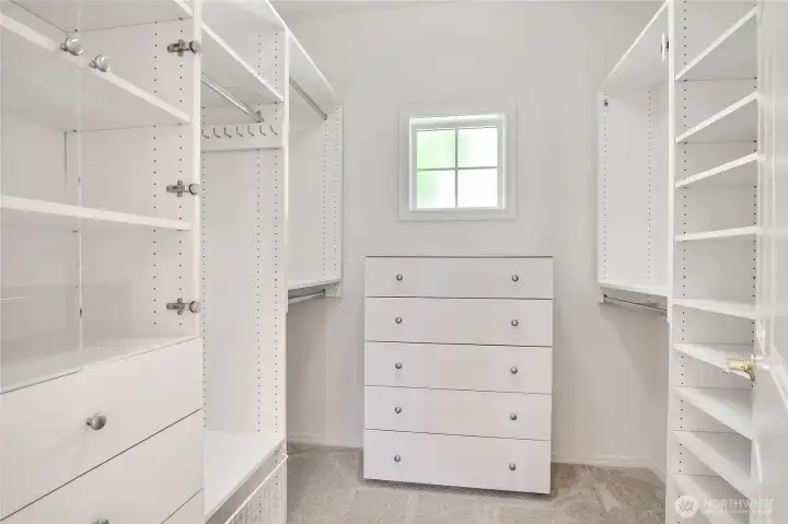 Custom primary closet with california closet kit