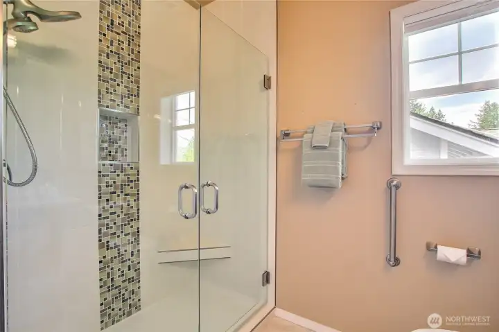 second luxury bath with custom tile work.