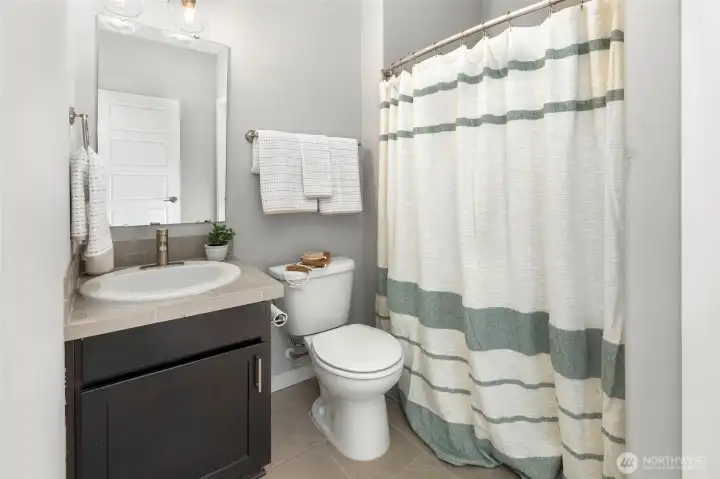 Full bath in main level bedroom.