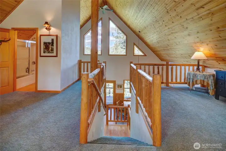 Upstairs loft primary suite. Upstairs loft primary suite.