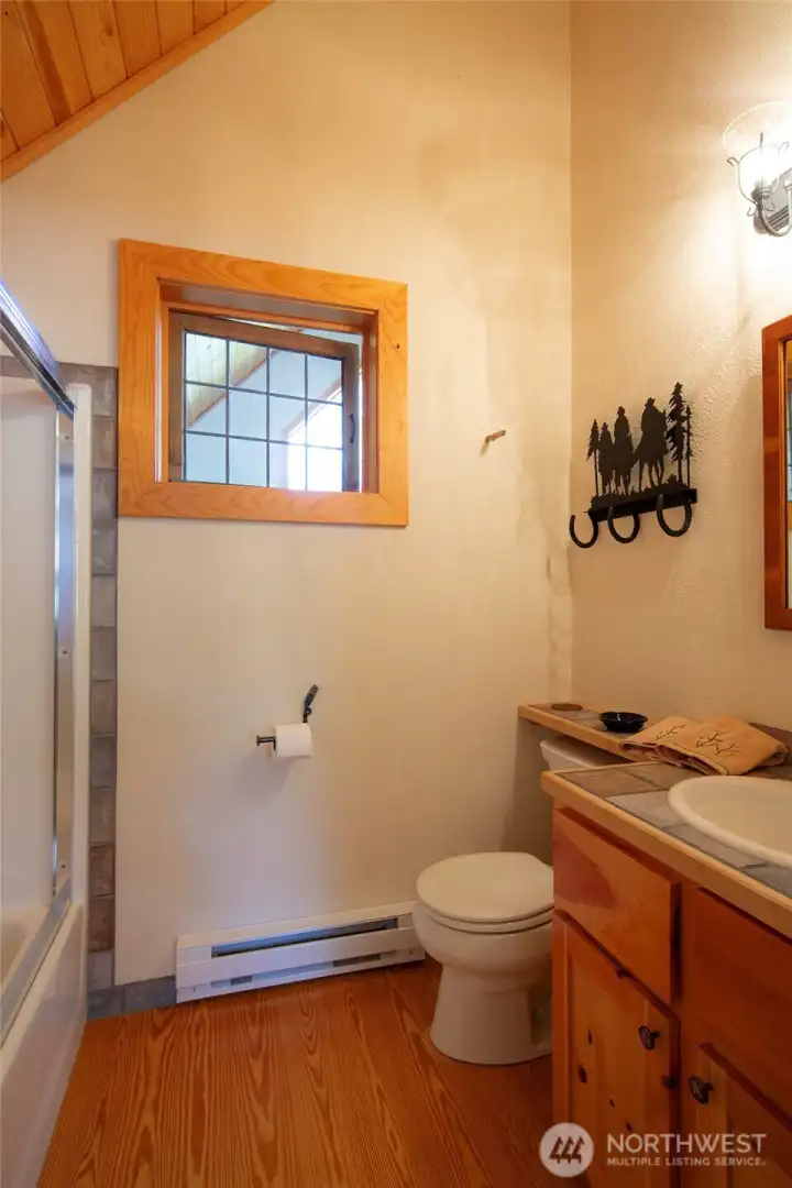Upstairs full bathroom. Upstairs full bathroom.