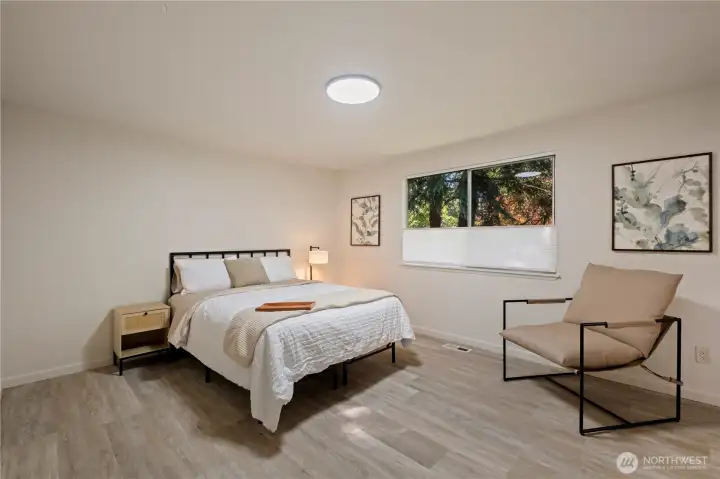 Primary Bedroom. Queen size bed for reference.