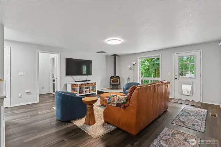Double doors from living room to back deck.