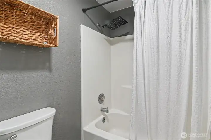 Primary tub and shower.
