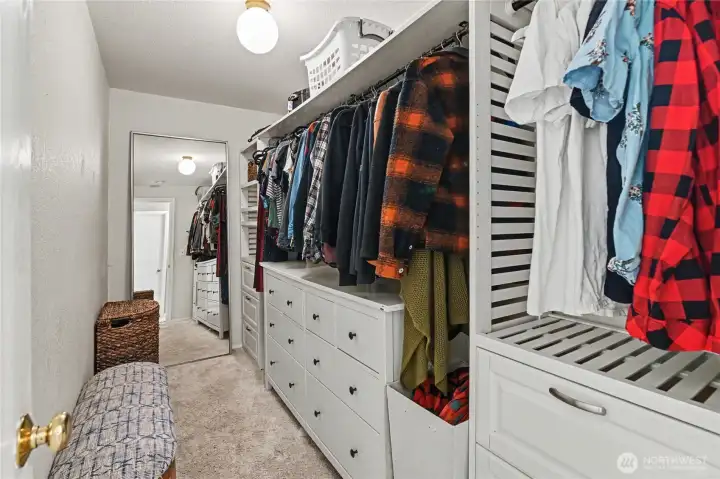 Oversized primary walk-in closet.
