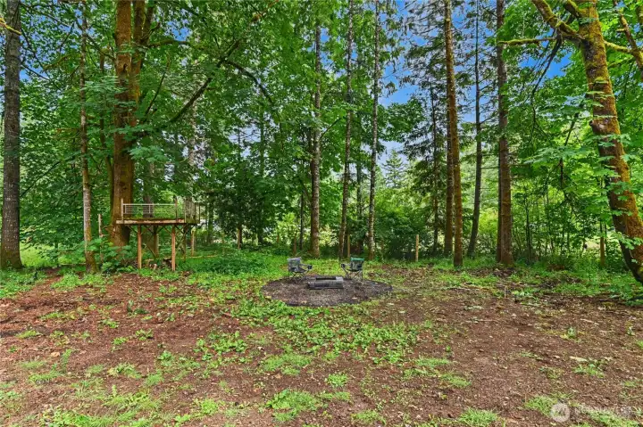 Private backyard offers a firepit. and if fully fenced.
