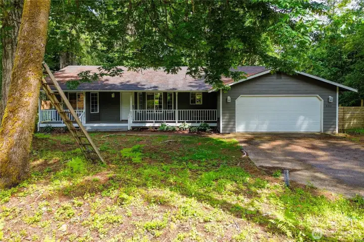 Lovely covered front porch welcomes you!
