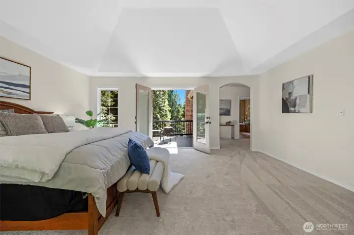 Primary suite with double doors to the private deck. Primary suite with double doors to the private deck.