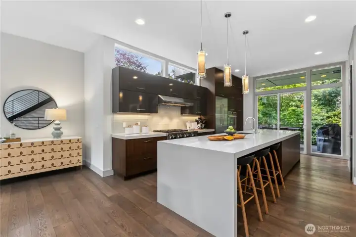 Kitchen with oversized island and seating for 6