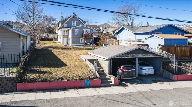 2 car carport accessed from Roosevelt Ave. High density zoning allows for additional units (buyer to verify with city)