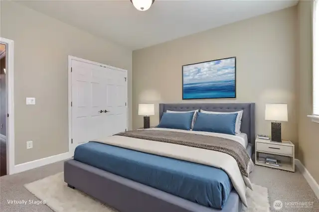 Bedroom two, love the double closets in all bedrooms. ***Virtually Staged***