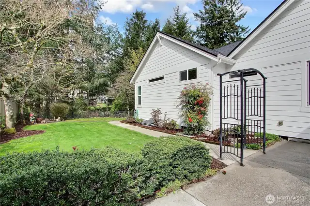 View of the side yard, perfect space for kiddos and/or doggos to play, territorial views abound.