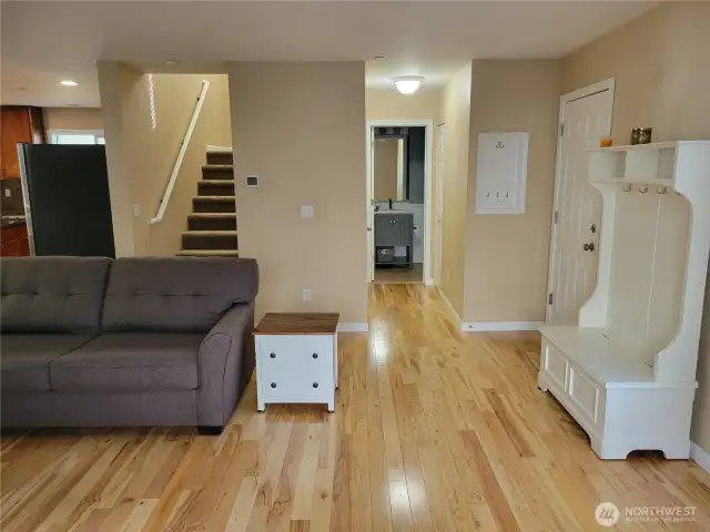 Living room showing stairs to 2nd floor