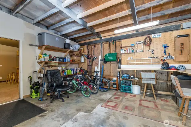 Great workshop space in the back of the garage. Door on the left leads to the awesome bonus/rec/media room!