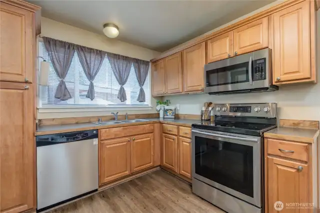 Kitchen window overlooks the private patio