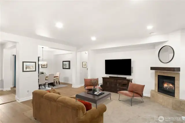 This well-maintained home has newer luxury vinyl plank floors, a propane fireplace, tall ceilings and new up-down Levelor window coverings.
