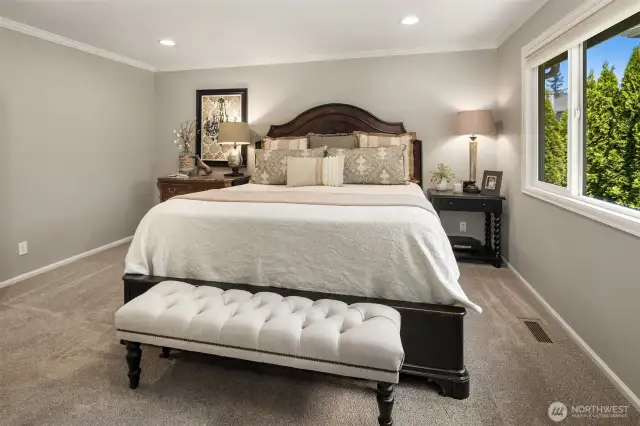 Plenty of room for your king sized bed and end table. Builder John Buchan thinks of everything and has crown molding to complete the room.