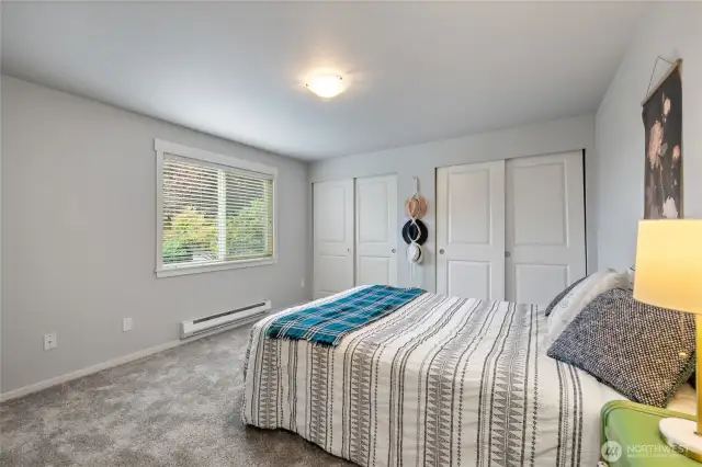 Primary bedroom- double closets with storage solutions.