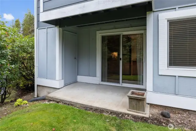 Covered patio also houses a locking storage unit.