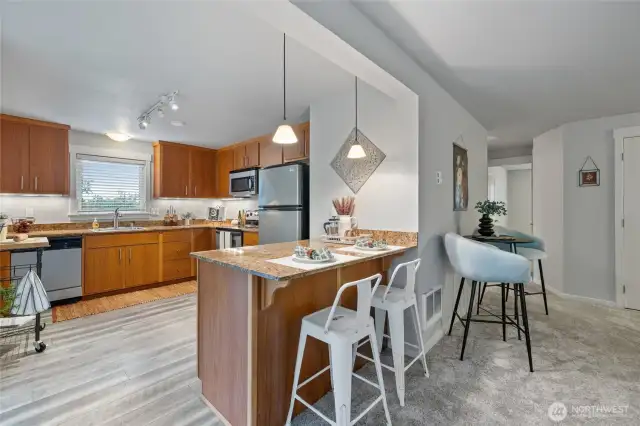 Eat-in, vinyl plank, granite, beautiful millwork- all updated.