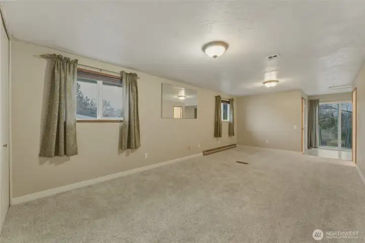 Primary Ensuite with Balcony Overlooking the Pool.