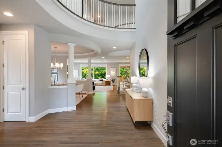 Dramatic entryway, spectacular architectural designs, trimmed millwork, skylights, and arched detailing throughout.