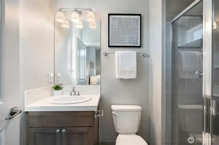 En suite bath for the bedroom suite.