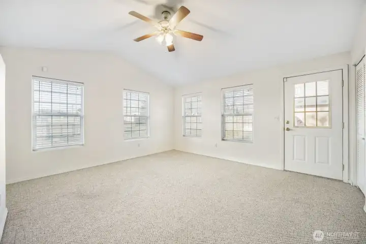 Den/office with a separate entrance on the side of the home.