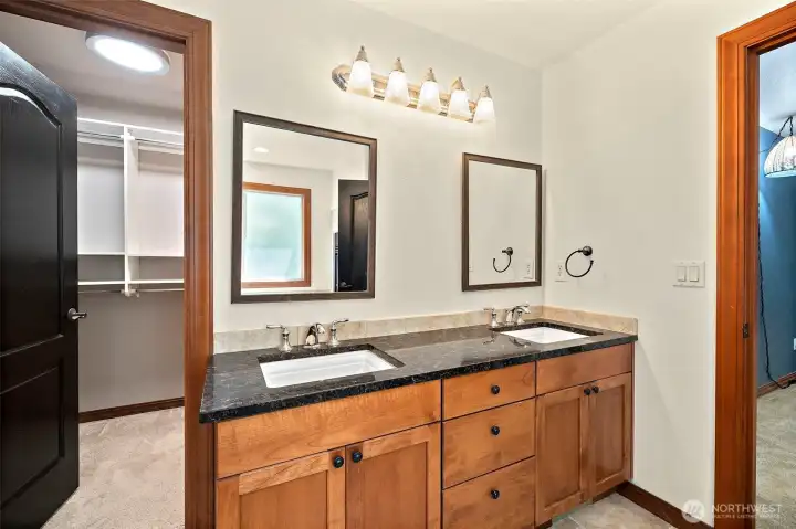 Dual vanity with walk in master closet