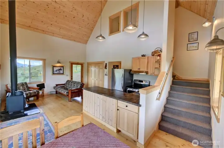 Vaulted ceilings and open floor plan lend to the spaciousness of this home.