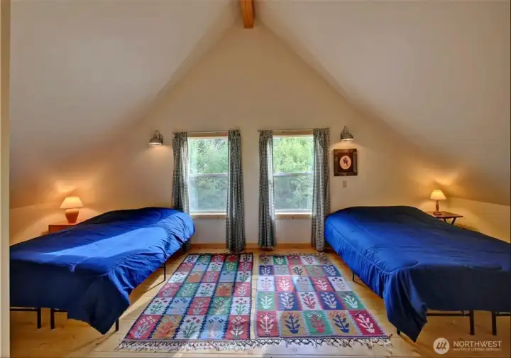 Upstairs loft is bright and spacious.  Could be used as primary bedroom.