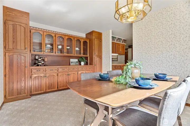 So much storage in this home!! Display your most beautiful pieces in the glass front cabinets w/built-in lighting. All in immaculate condition in this one owner home!