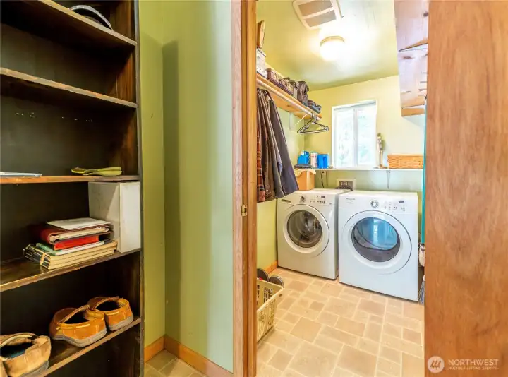 Full-size washer and dryer in the dedicated laundry room. Convenient and functional.