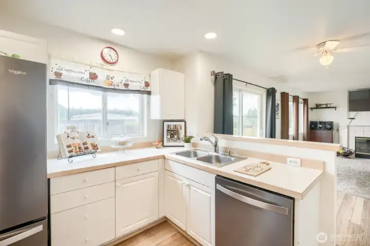Plenty of counter prep space & natural light.