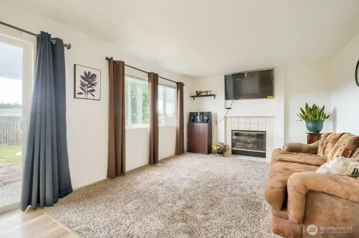 Spacious family room with cozy fireplace