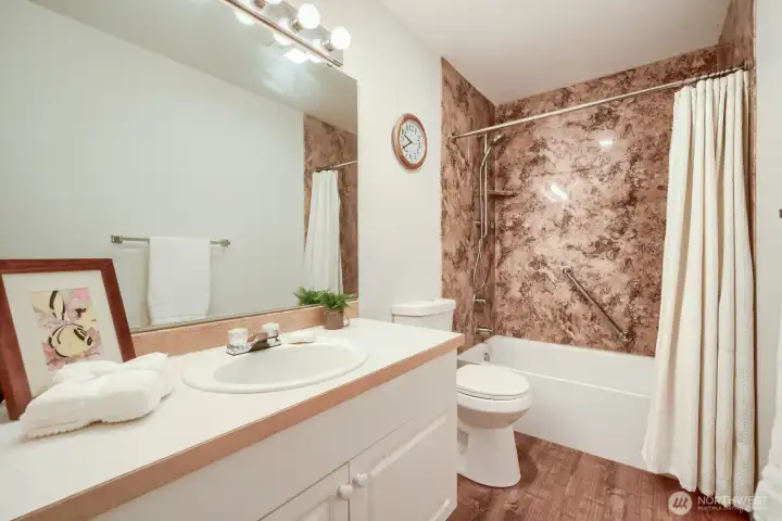 Large upstairs bathroom w/ linen closet.