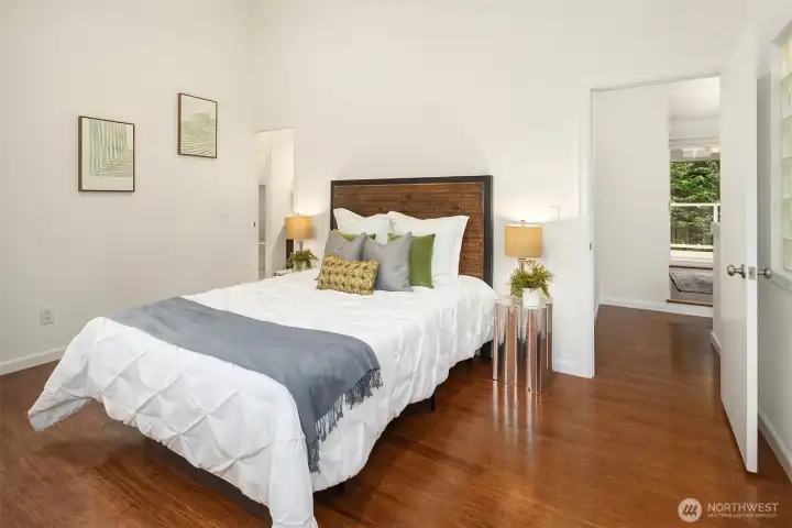Primary Suite with loft/office space, French door to upper roof top deck overlooking the park. The primary suite also offers the updated 5 pc primary bath with walk-in closet.