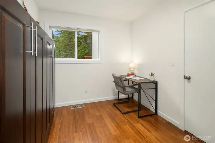 another main floor bedroom with murphy bed