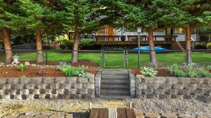 Lushly landscaped yard on the over 16,000 sq ft lot.
