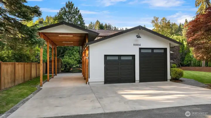 Another view of the RV/Boat parking, 4 car garage (with parking for taller vehicles) and shop space