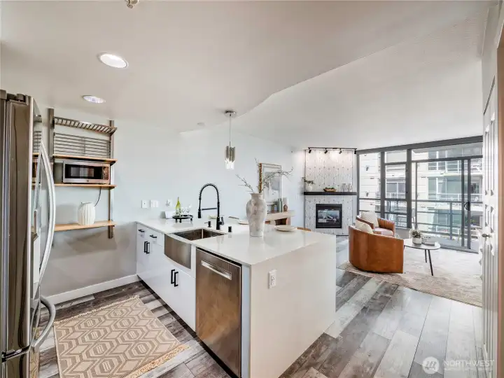 An open, light-filled kitchen that flows from your front door straight into everyday luxury.