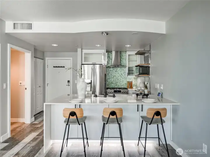 Where morning coffee and evening wine share the same gleaming quartz counter.