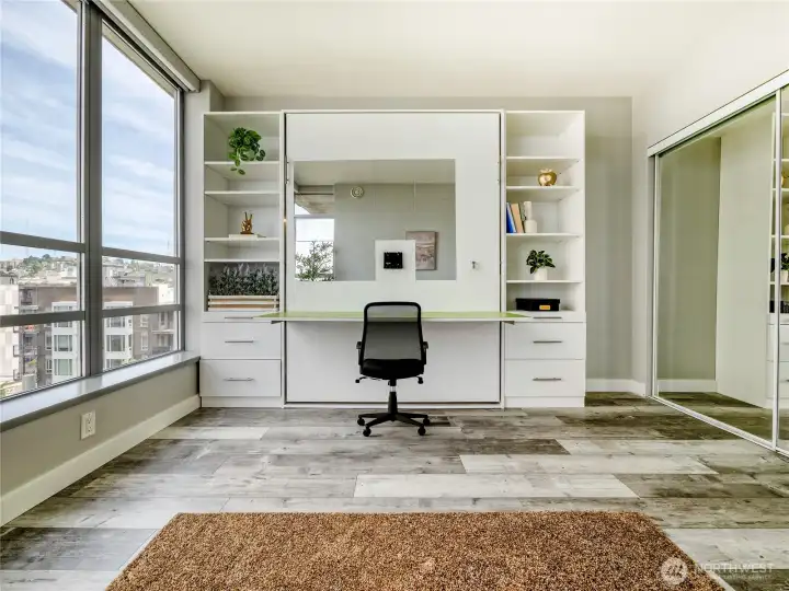 A room that works as hard as you do, fold-down desk by day, sanctuary by night.