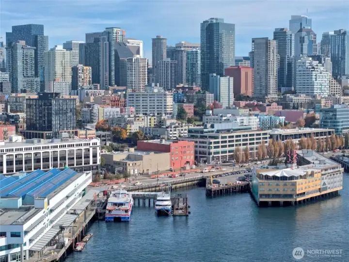 Immerse yourself in the vibrant energy of the Seattle waterfront from a vantage point that is truly yours