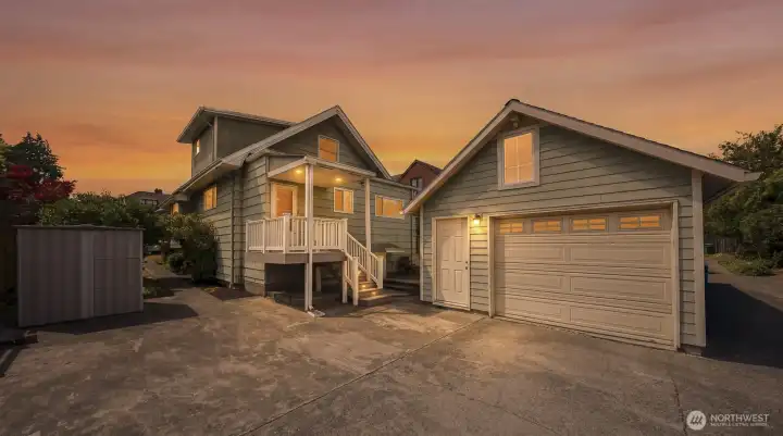 Detached garage with work bench. Alley access and 2 off street parking stalls. Detached garage with work bench. Alley access and 2 off street parking stalls.